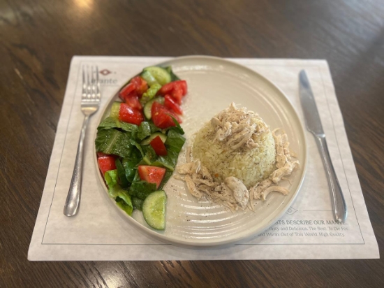 Picture of Rice with boiled chicken and salad