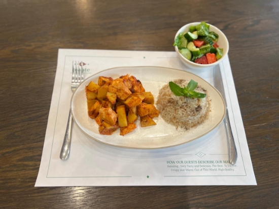 Picture of Chicken and potato with rice and salad