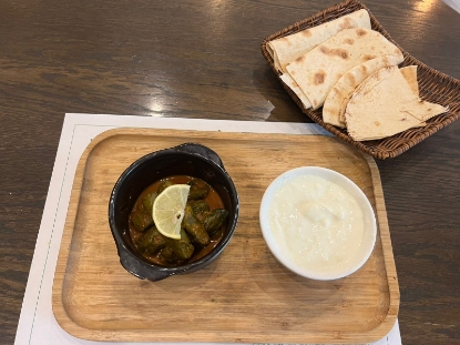 Picture of Beef Sarma with yogurt and bread